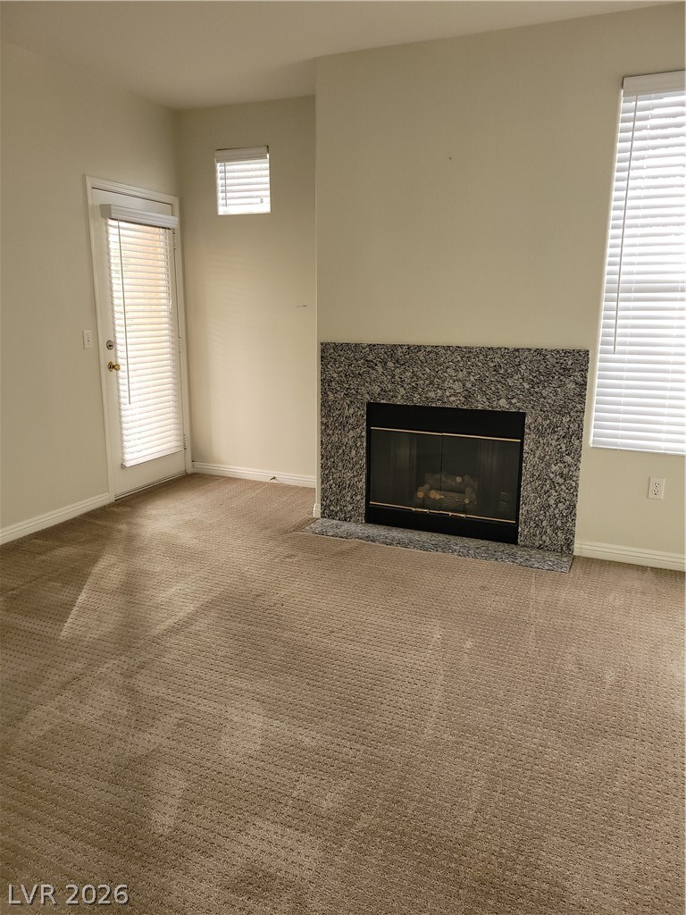 8555 West Russell Road, Unit 2094 Las Vegas, NV 89113 - Photo 6 of 31 Large living room with fireplace