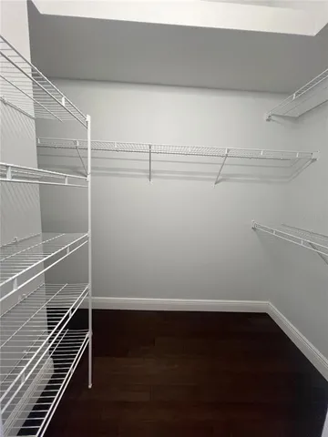 a view of a room with racks on the wall