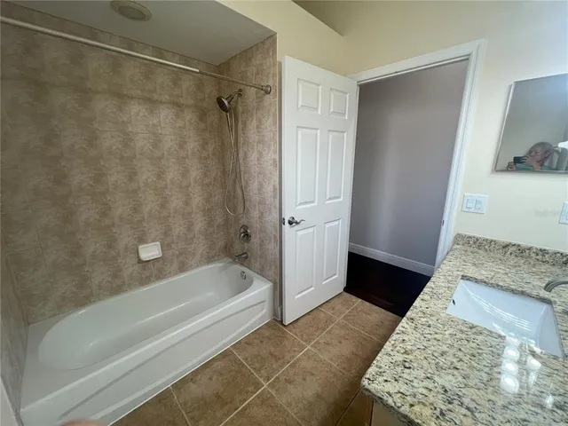 a view of livingroom with furniture and floor to ceiling window