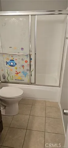 a bathroom with a sink and a shower