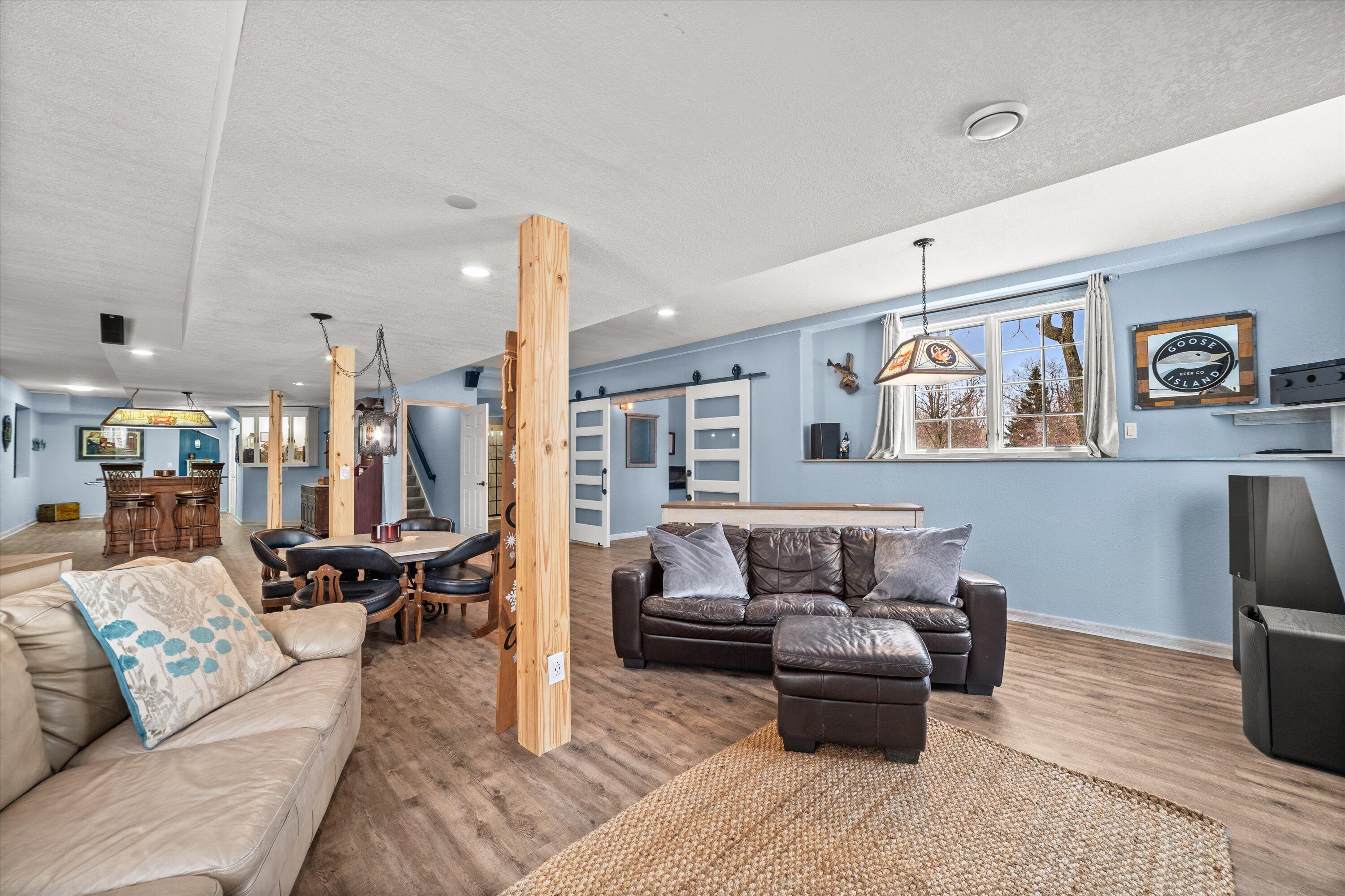 139 Legend Court Wales, WI 53183 - Photo 62 of 103 LVP Flooring and Large Windows