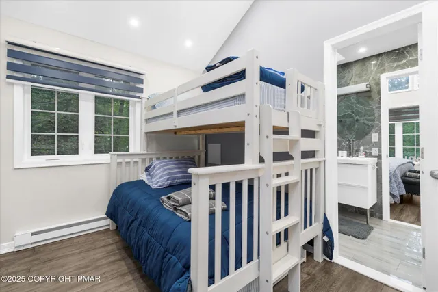 a view of porch with furniture and large windows