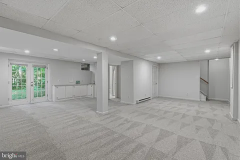 a view of a room with wooden walls