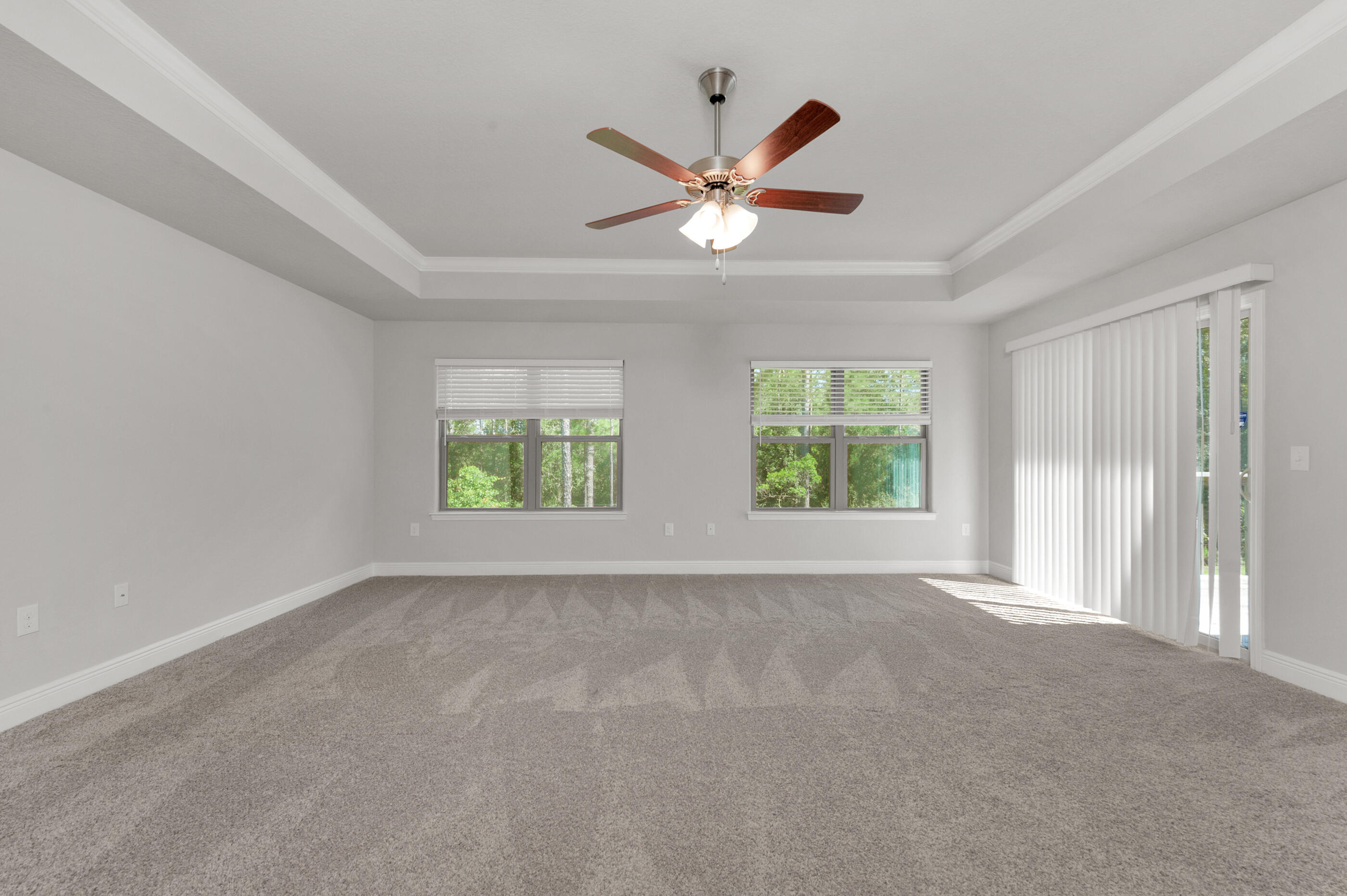 306 Vale Loop Crestview, FL 32536 - Photo 17 of 40 a view of room with window and ceiling fan
