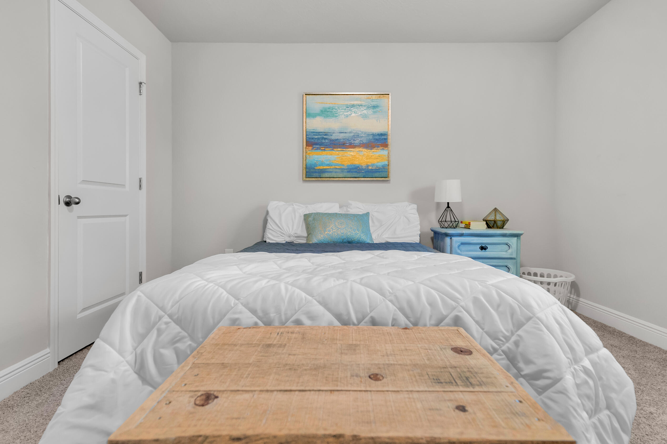 306 Vale Loop Crestview, FL 32536 - Photo 27 of 40 a bedroom with a bed and painting on the wall