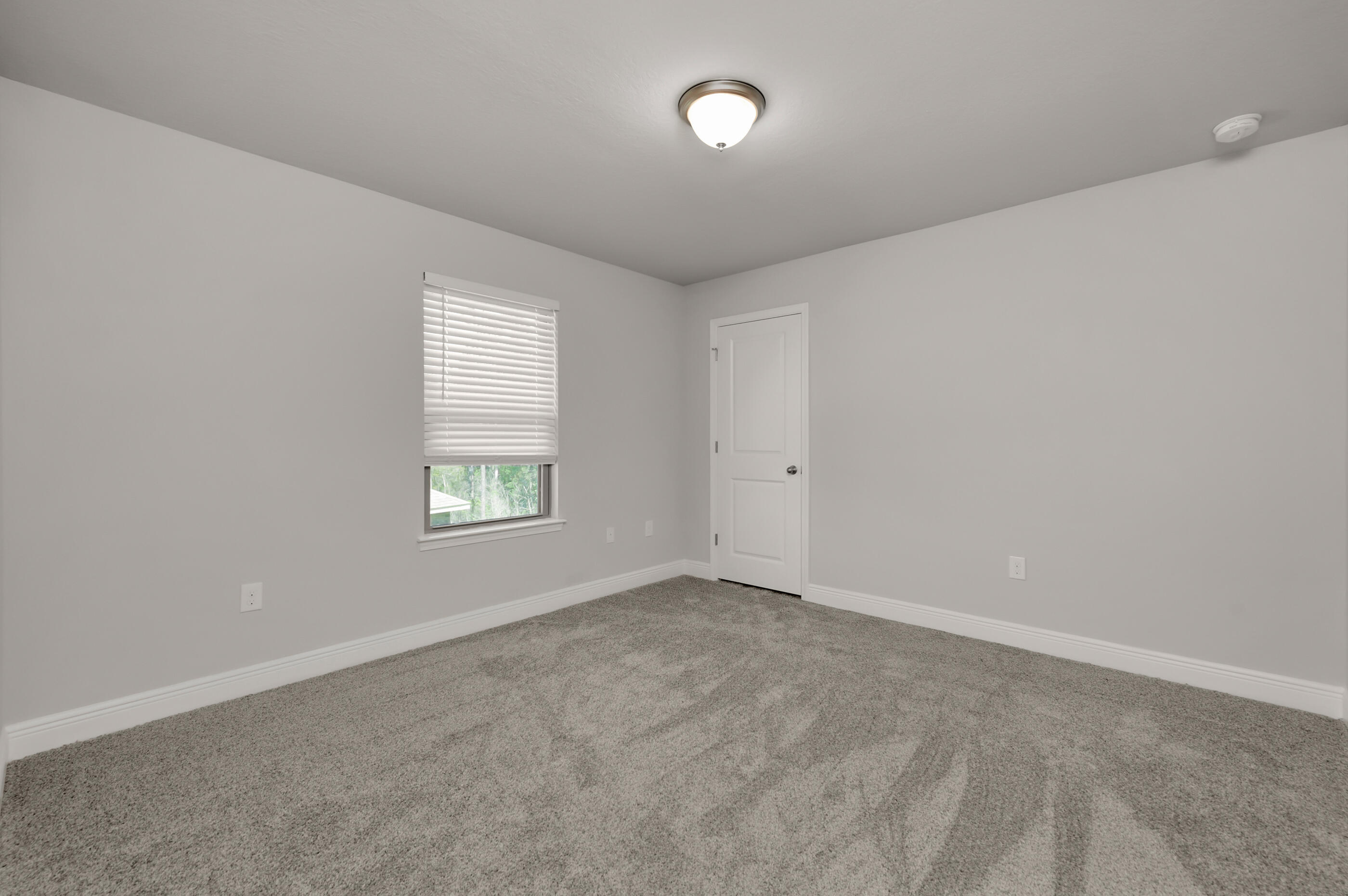 306 Vale Loop Crestview, FL 32536 - Photo 28 of 40 an empty room with windows