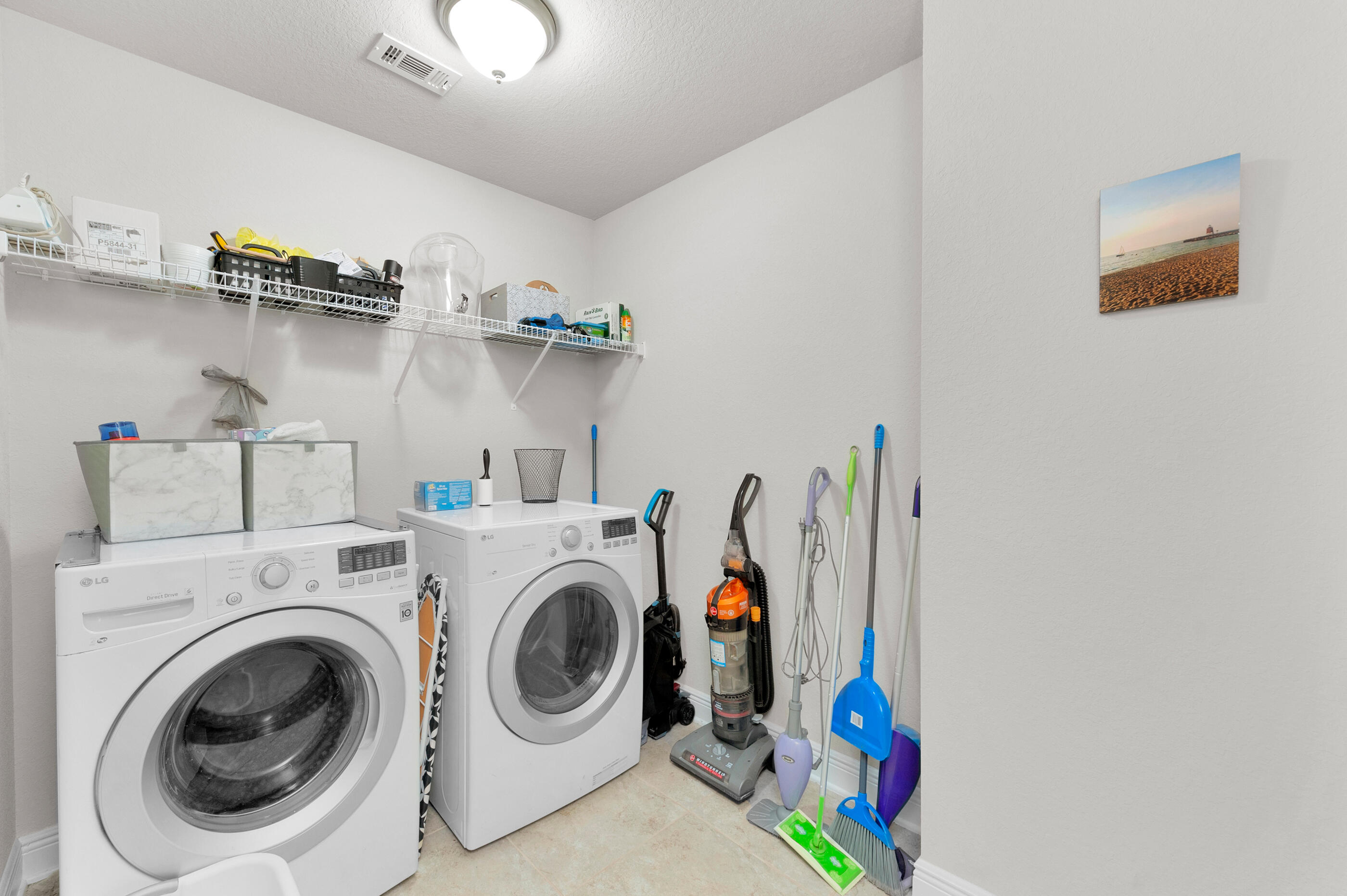 306 Vale Loop Crestview, FL 32536 - Photo 35 of 40 a utility room with dryer and washer