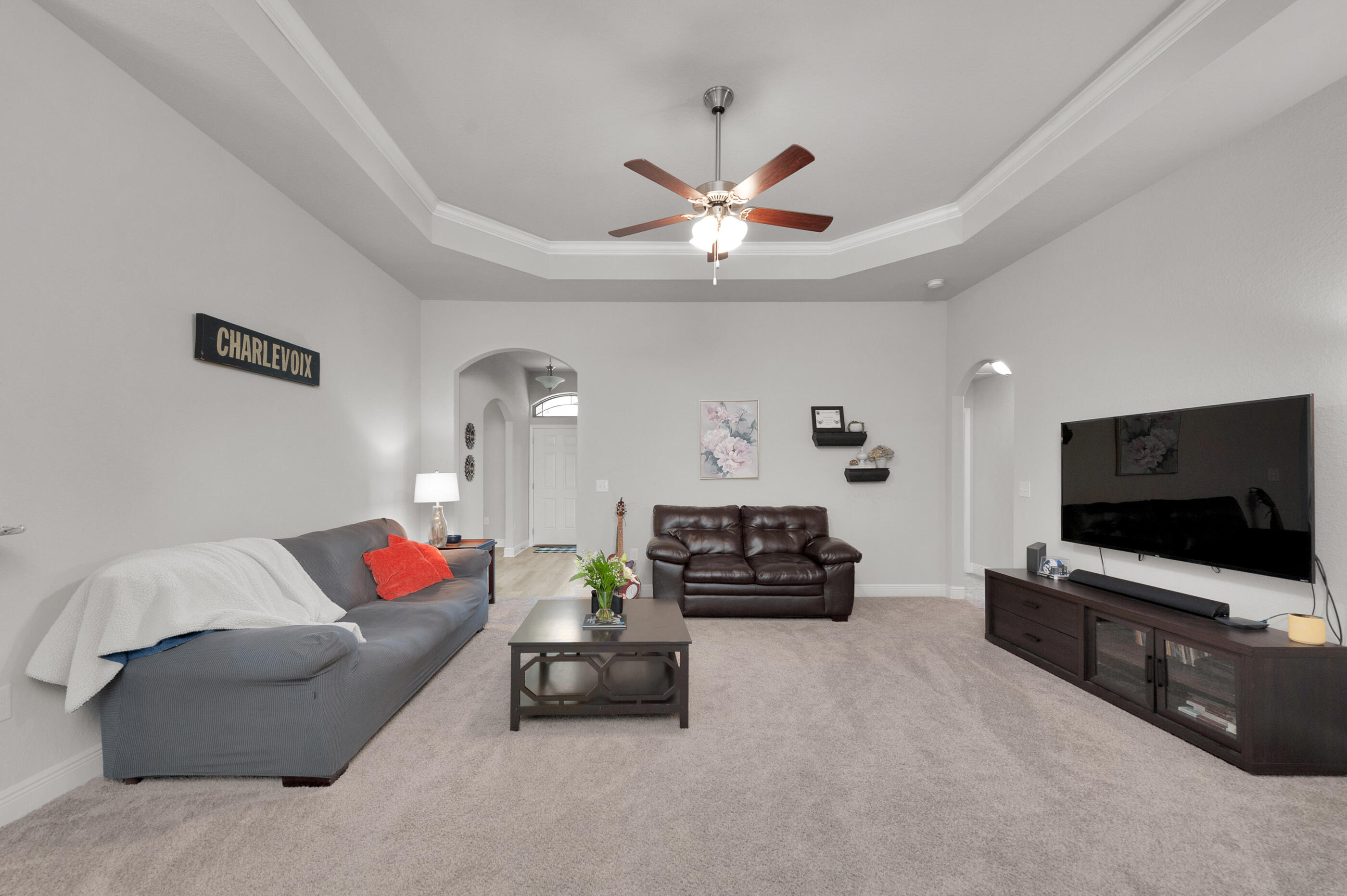 306 Vale Loop Crestview, FL 32536 - Photo 6 of 40 a living room with furniture and a flat screen tv