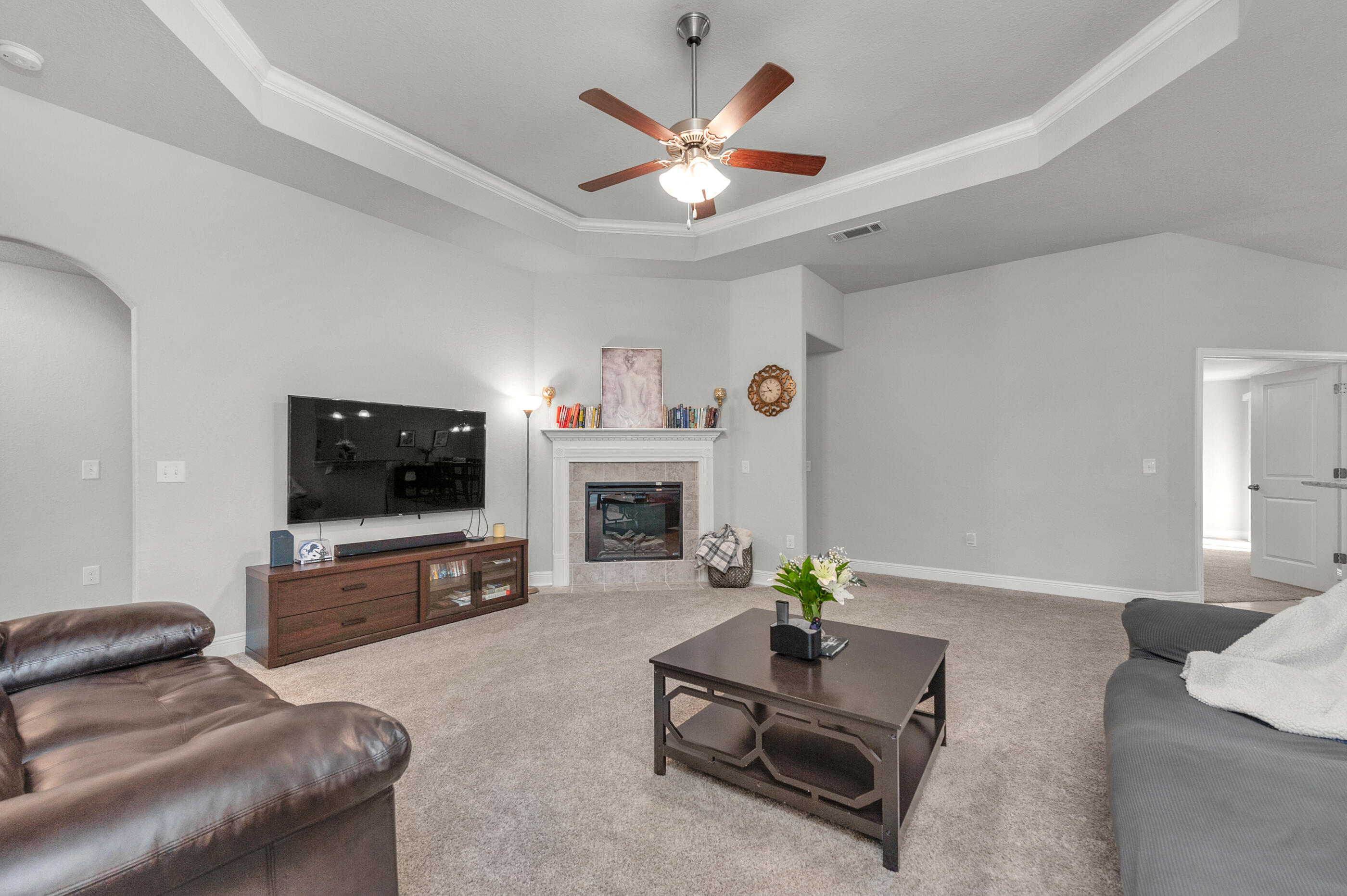 306 Vale Loop Crestview, FL 32536 - Photo 7 of 40 a living room with furniture and a flat screen tv