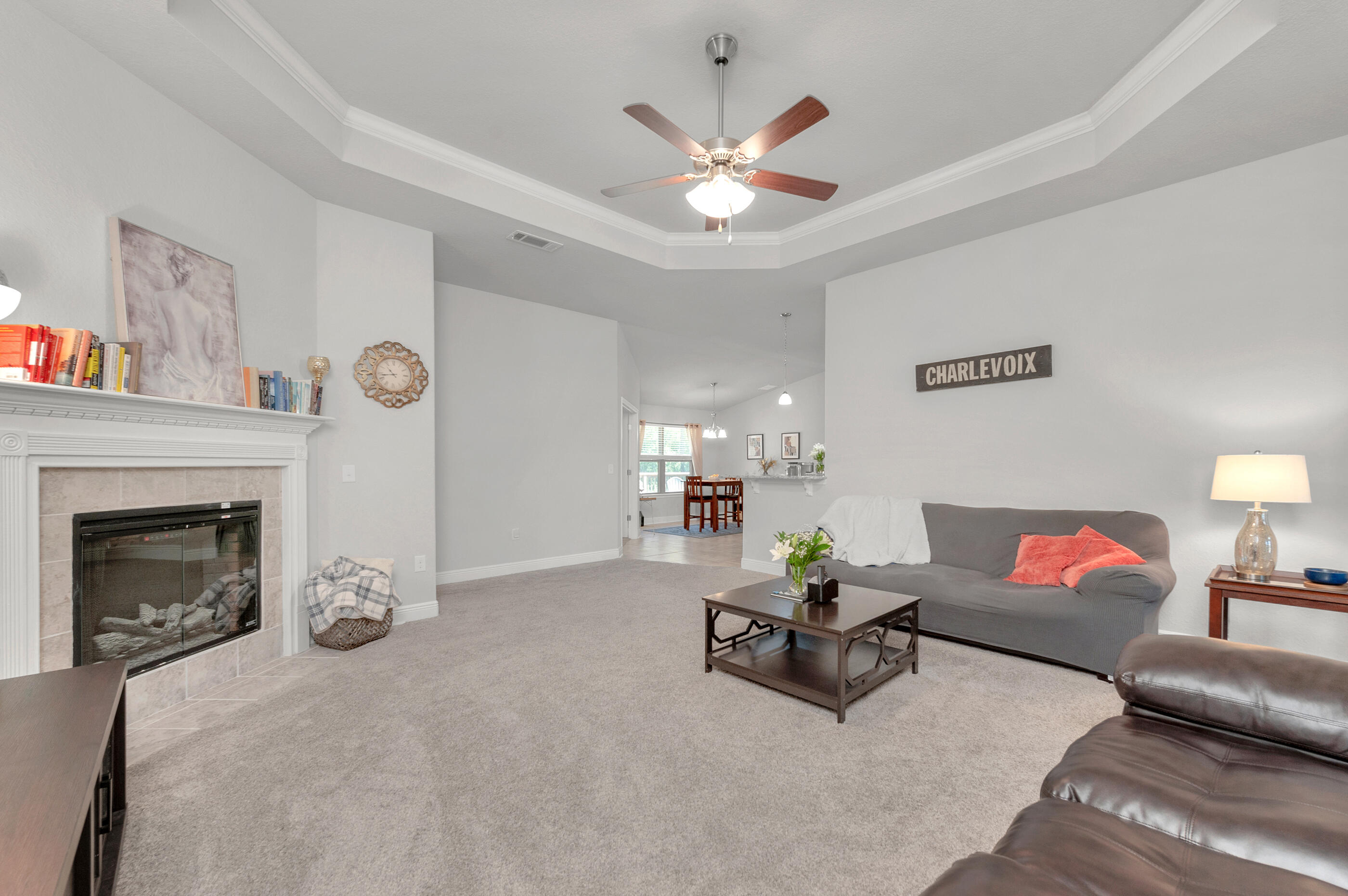 306 Vale Loop Crestview, FL 32536 - Photo 8 of 40 a living room with furniture and a fireplace