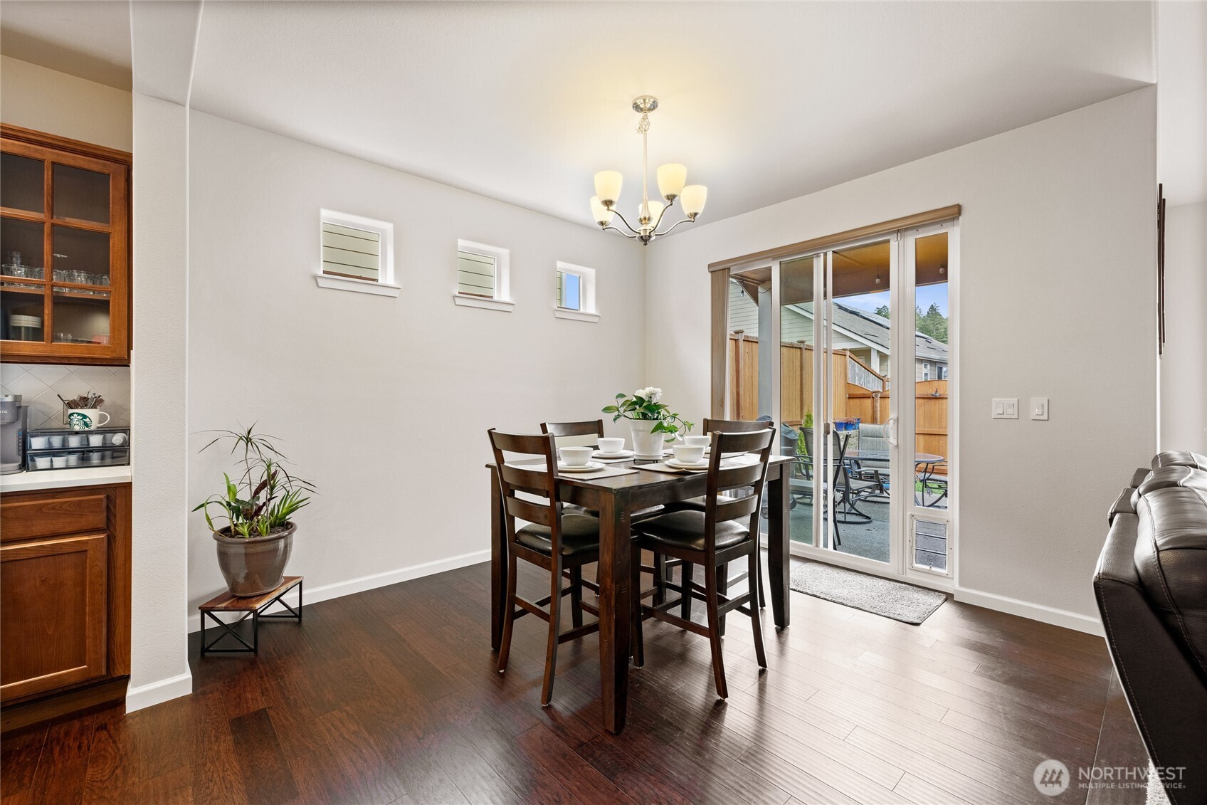 736 Mandee Street Southeast Lacey, WA 98513 - Photo 14 of 35 a view of a dining room with furniture window and wooden floor