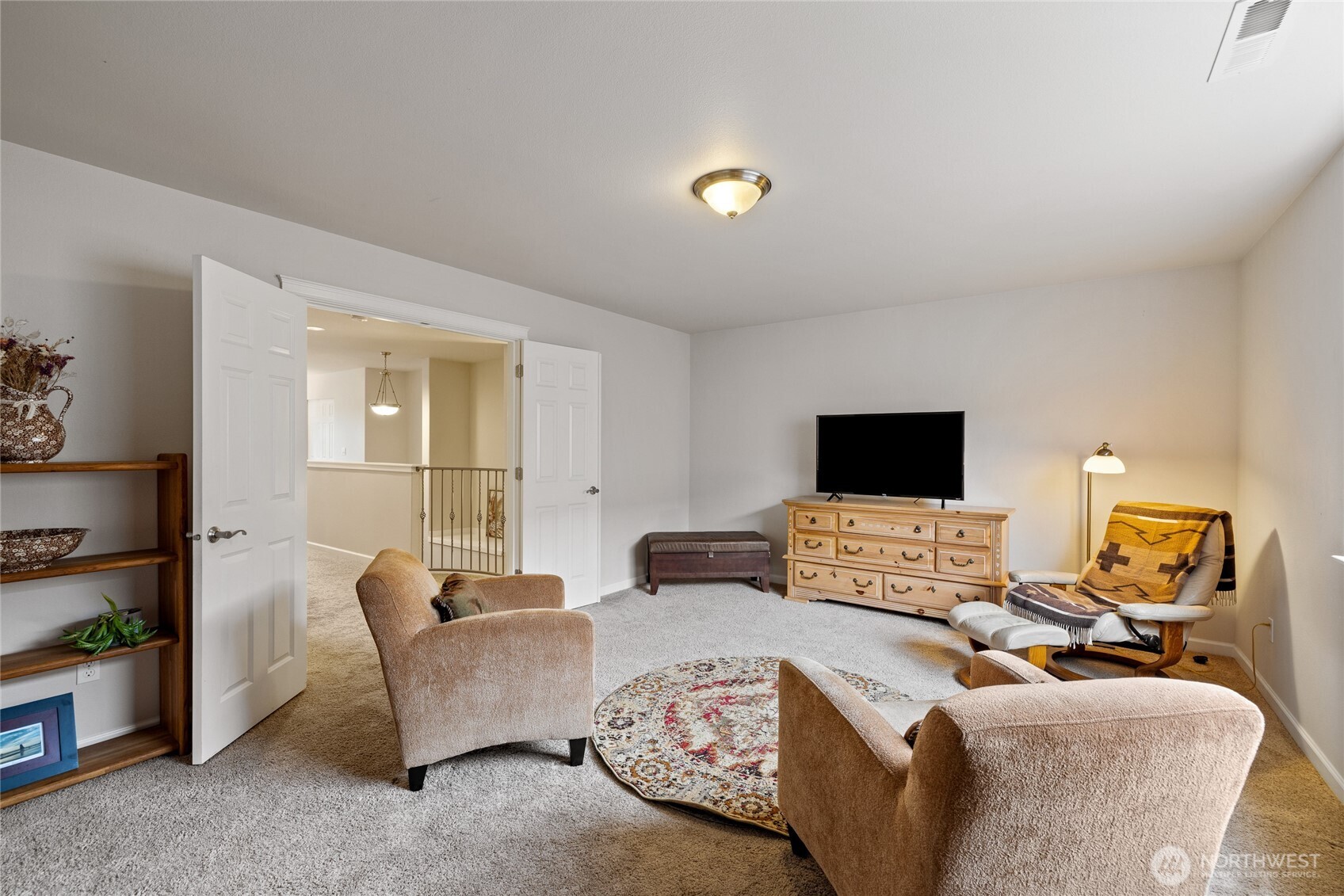 736 Mandee Street Southeast Lacey, WA 98513 - Photo 27 of 35 a living room with furniture and a flat screen tv