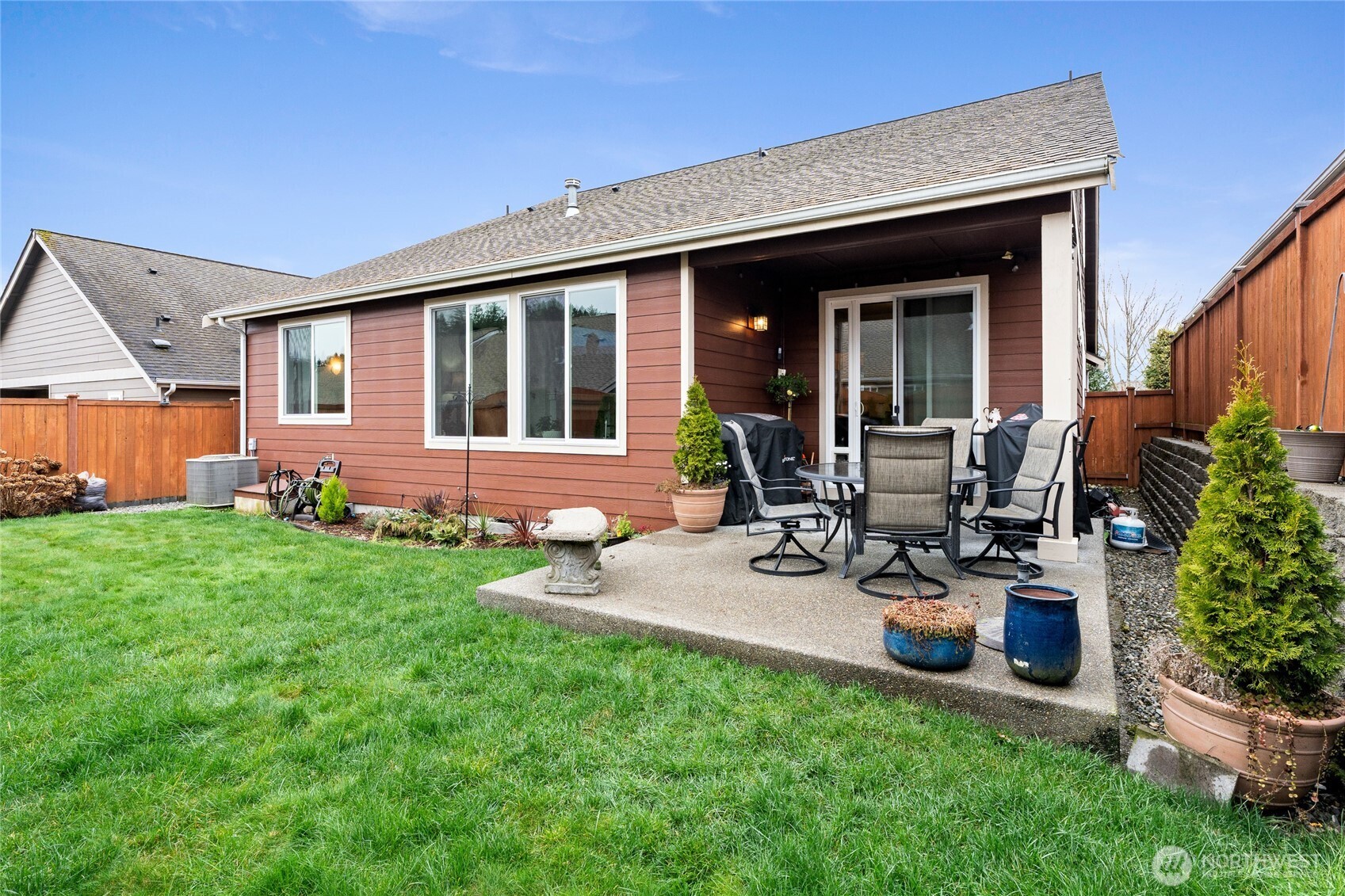 736 Mandee Street Southeast Lacey, WA 98513 - Photo 31 of 35 a view of an house with backyard space and garden