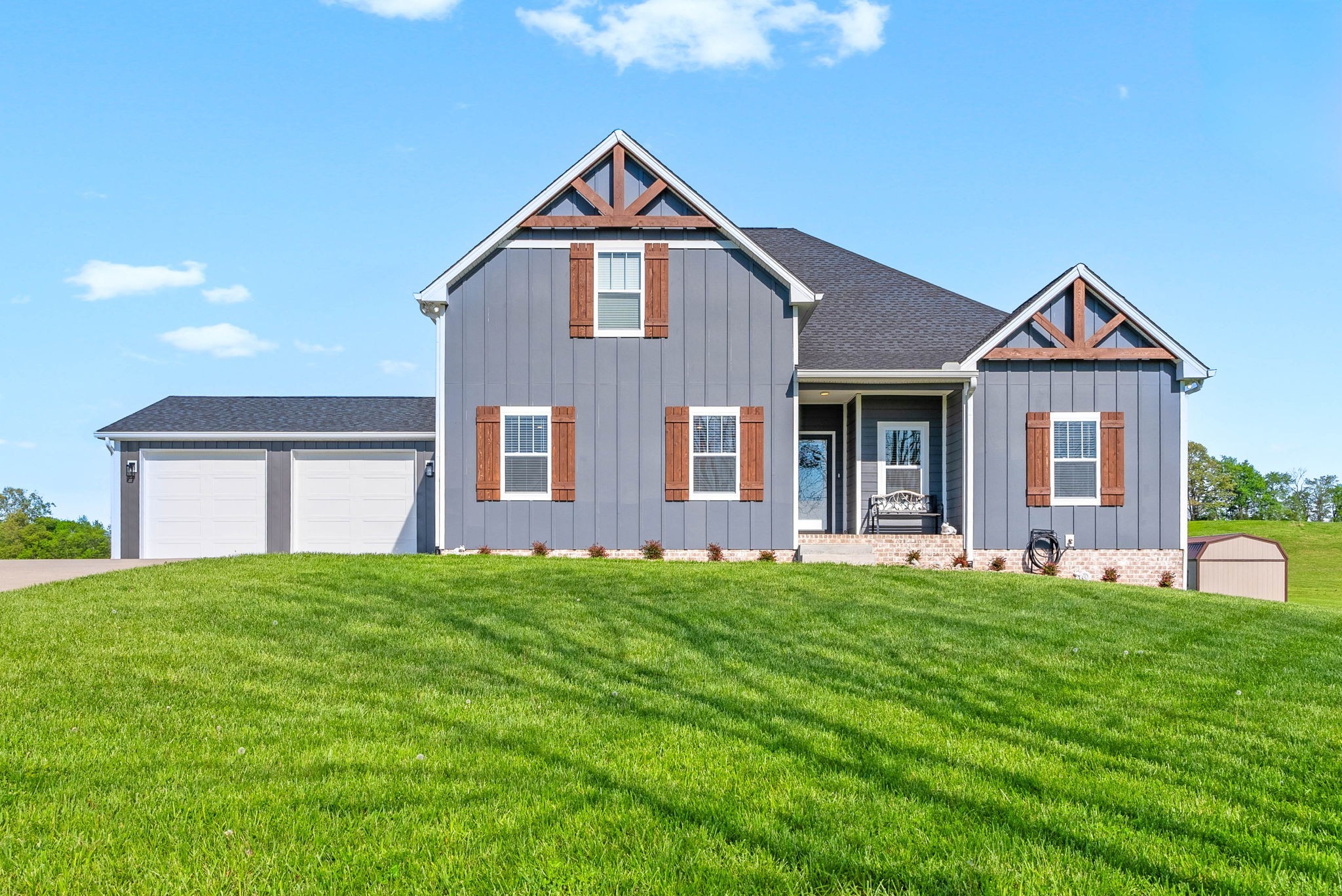 5685 Minnis Road Springfield, TN 37172 - Photo 1 of 93 a front view of a house with a yard and garage