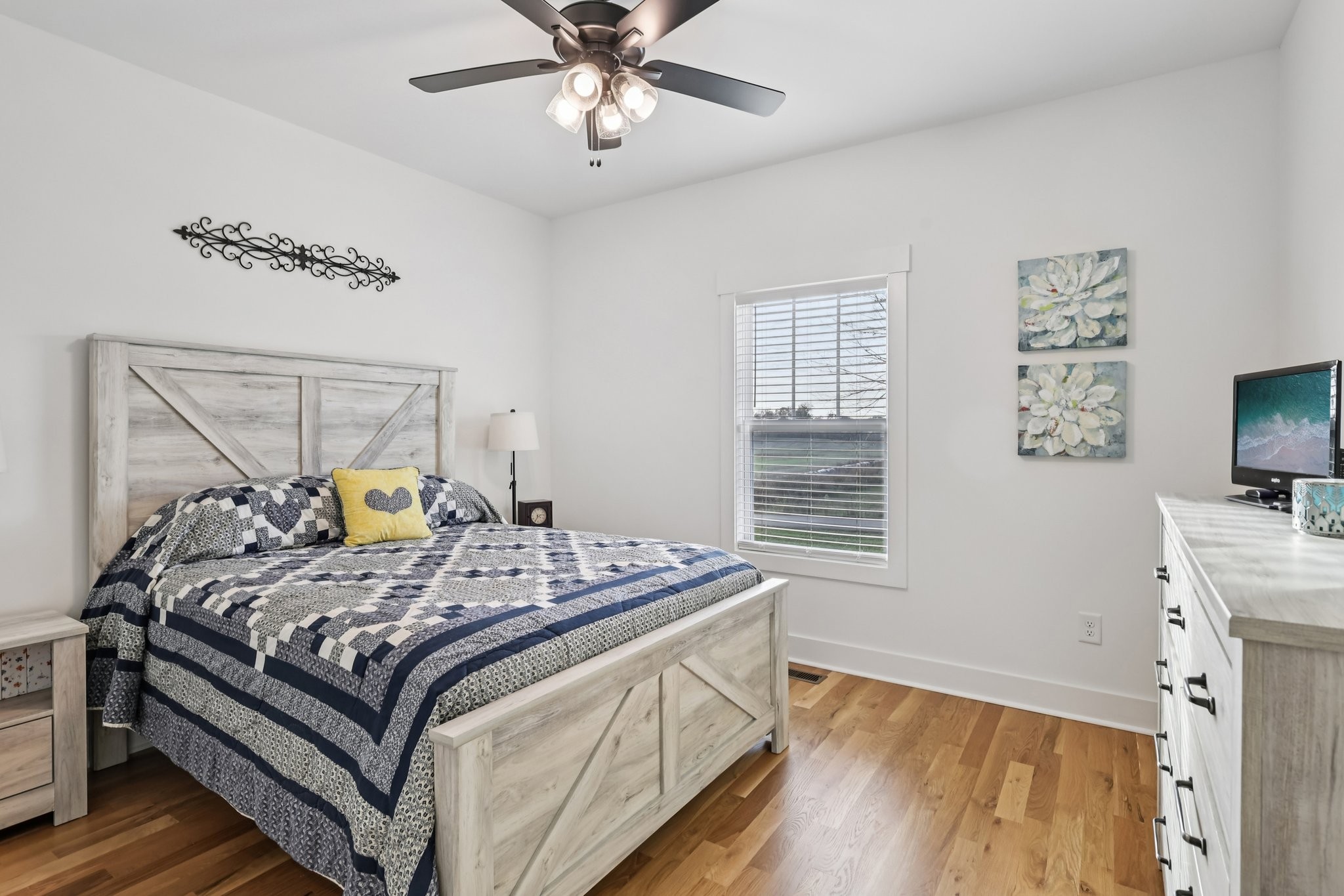 5685 Minnis Road Springfield, TN 37172 - Photo 47 of 93 a bed sitting in a bedroom next to a window