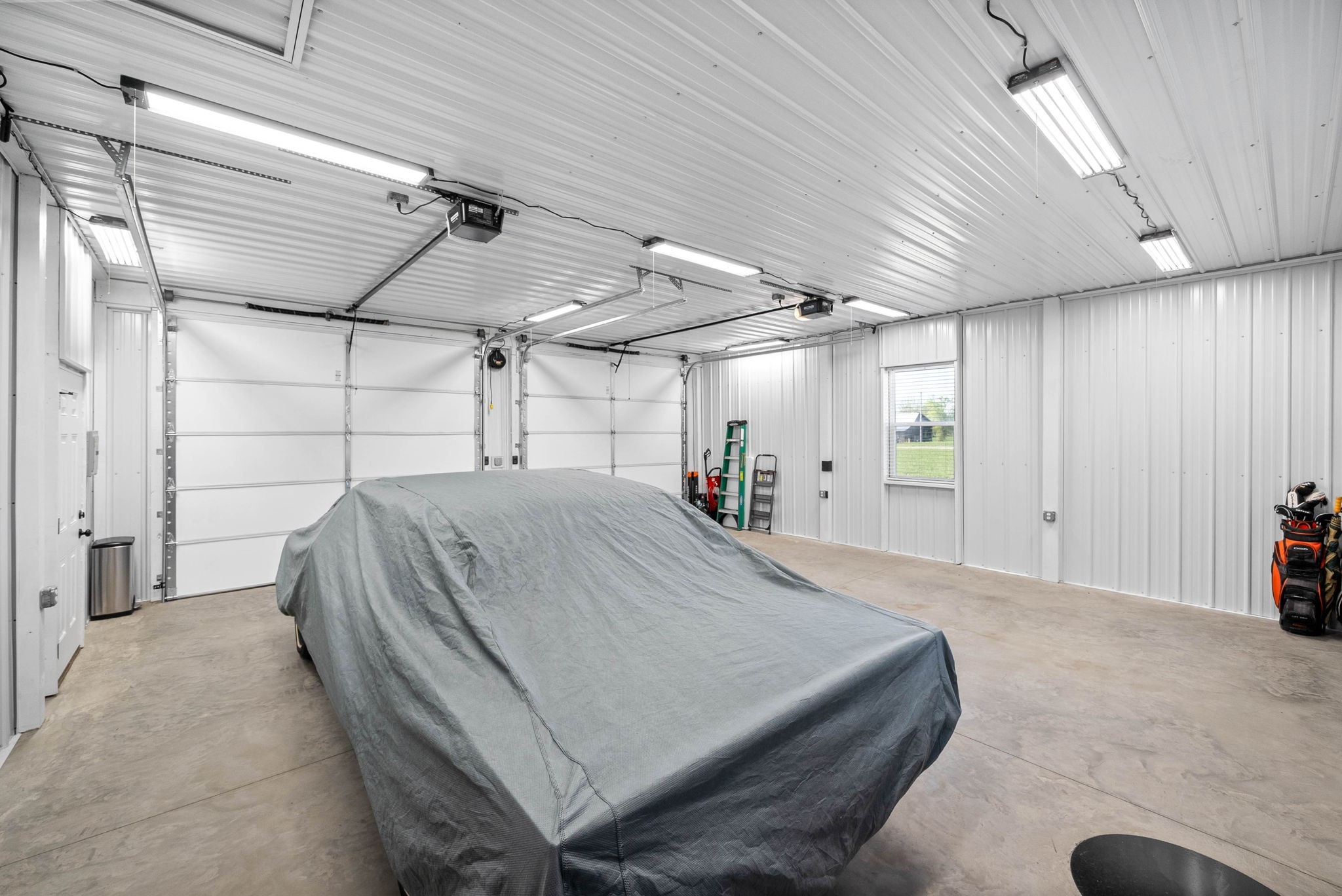 5685 Minnis Road Springfield, TN 37172 - Photo 56 of 93 a bed room with a bed and a walk in closet