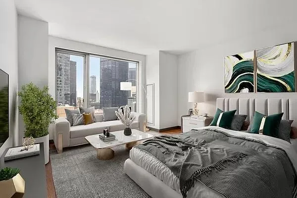 a bed room with a bed and a couch