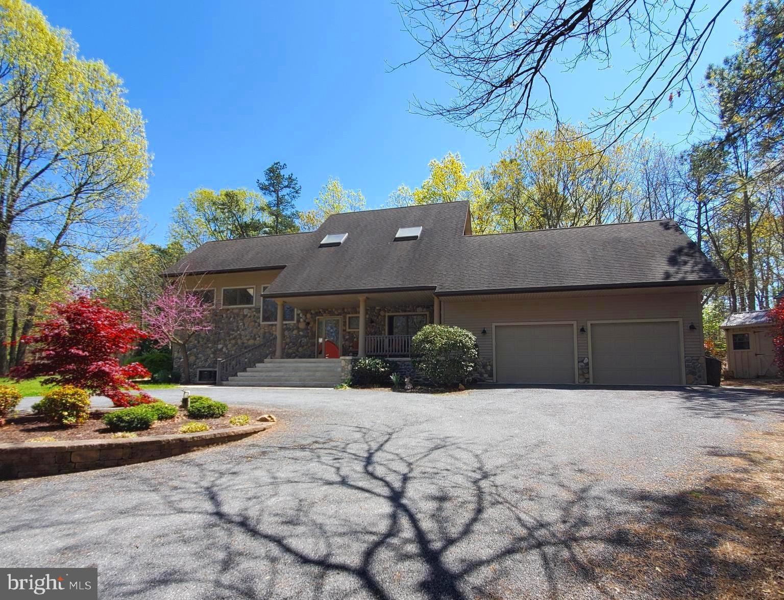 36 Cobbs Mill Road Alloway, NJ 08302 - Photo 1 of 41 a front view of a house with a yard and potted plants