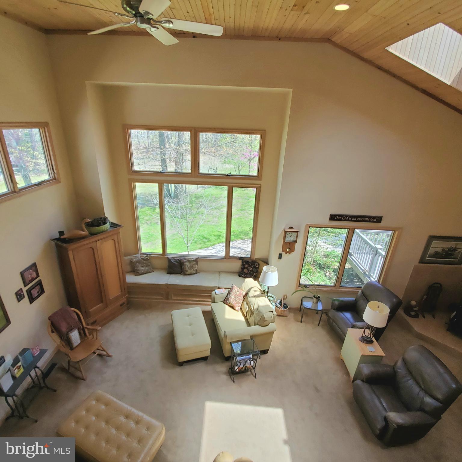 36 Cobbs Mill Road Alloway, NJ 08302 - Photo 17 of 41 a living room with furniture and a large window