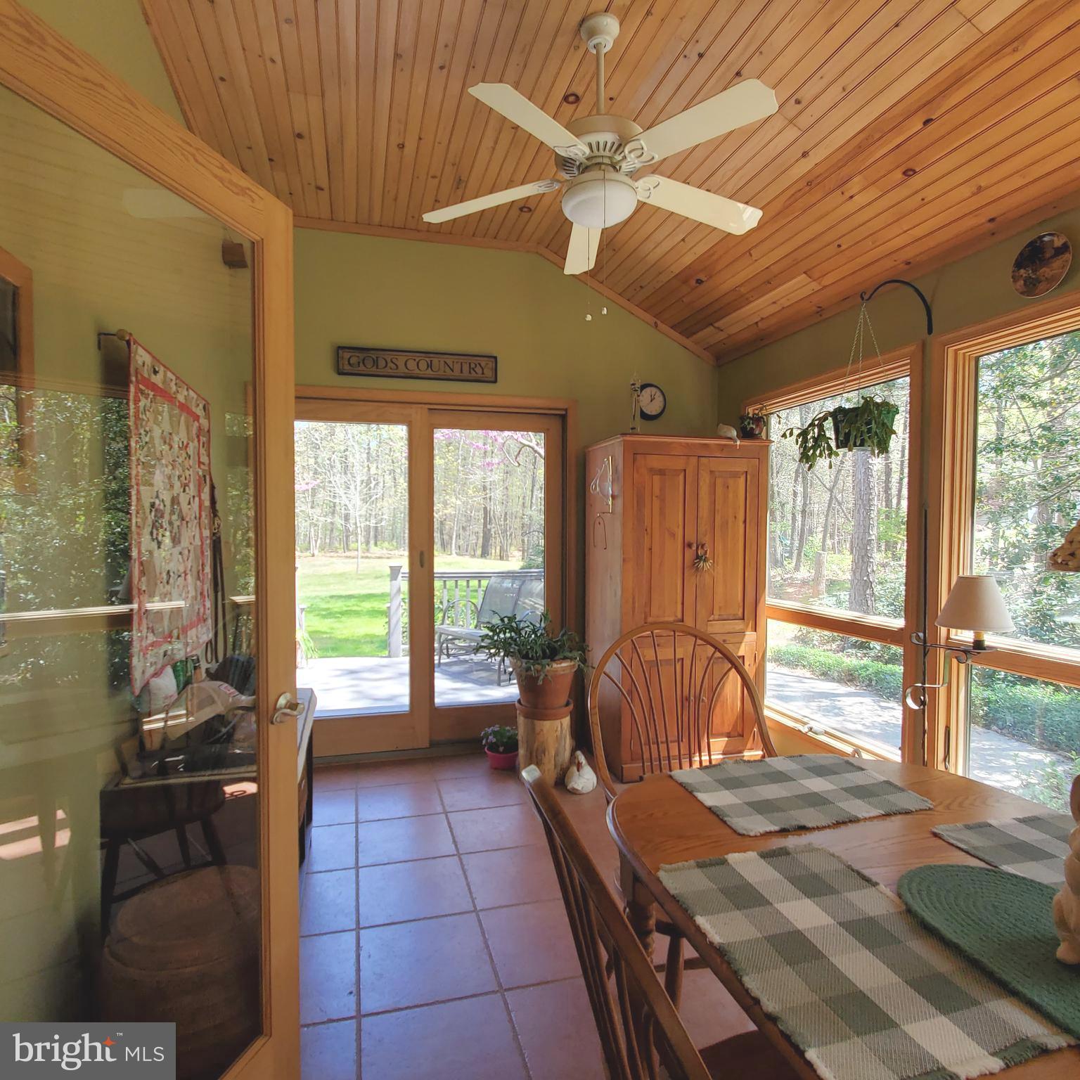 36 Cobbs Mill Road Alloway, NJ 08302 - Photo 23 of 41 a room with gym equipment and large windows