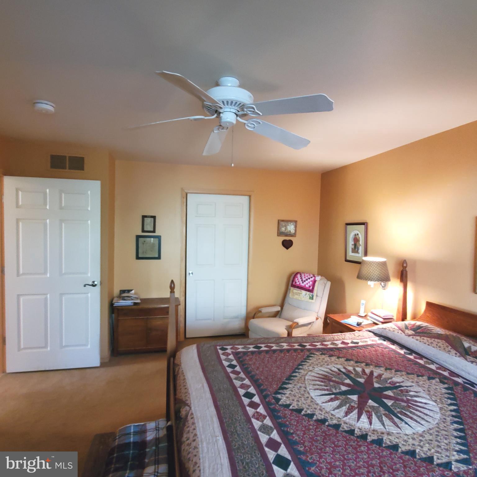 36 Cobbs Mill Road Alloway, NJ 08302 - Photo 25 of 41 a bedroom with a bed and wooden floor