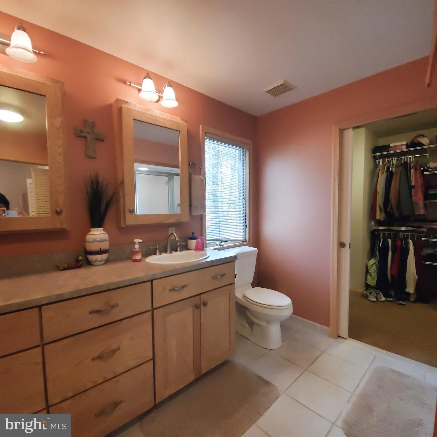 36 Cobbs Mill Road Alloway, NJ 08302 - Photo 27 of 41 a bathroom with a toilet sink and mirror