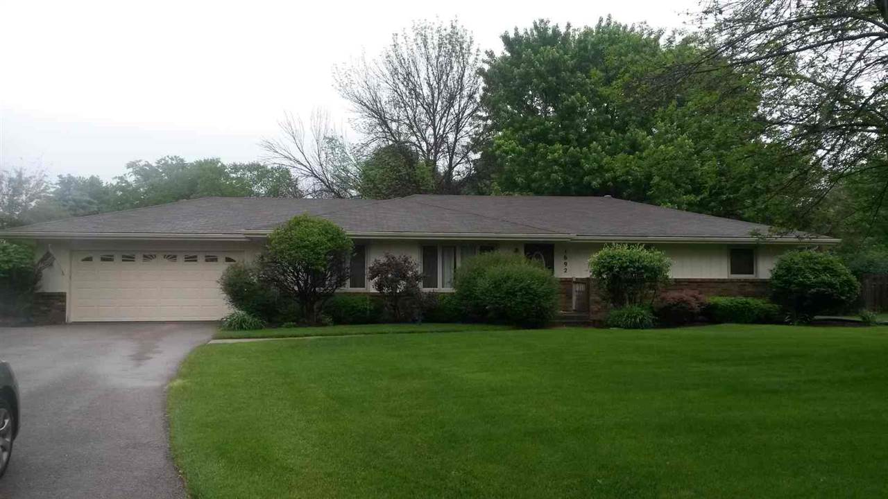 1692 Ben Franklin Road Rockford, IL 61108 - Photo 1 of 1 a view of a big yard in front of house
