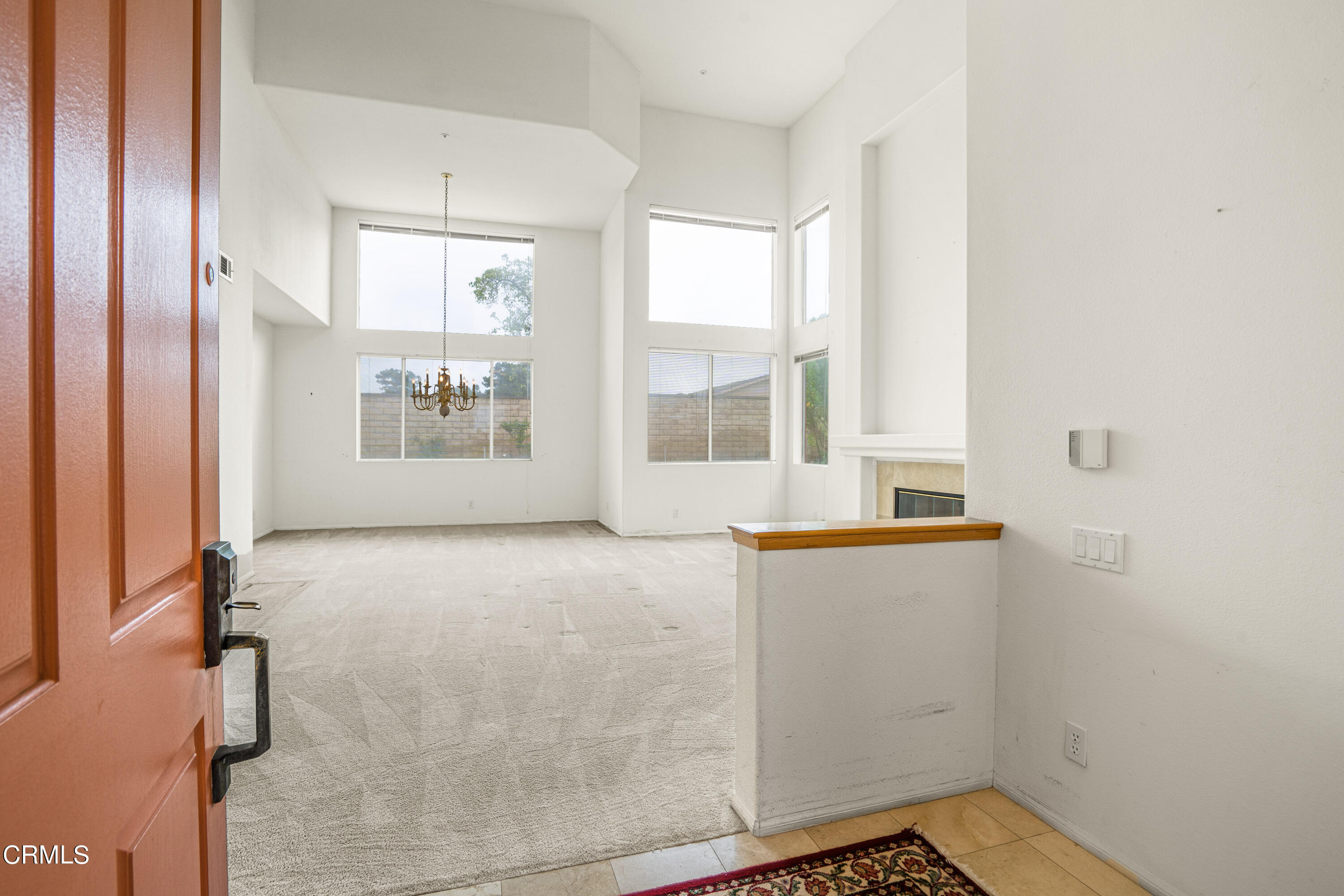 2410 Ivory Way Oxnard, CA 93036 - Photo 2 of 64 a view of an empty room with a window