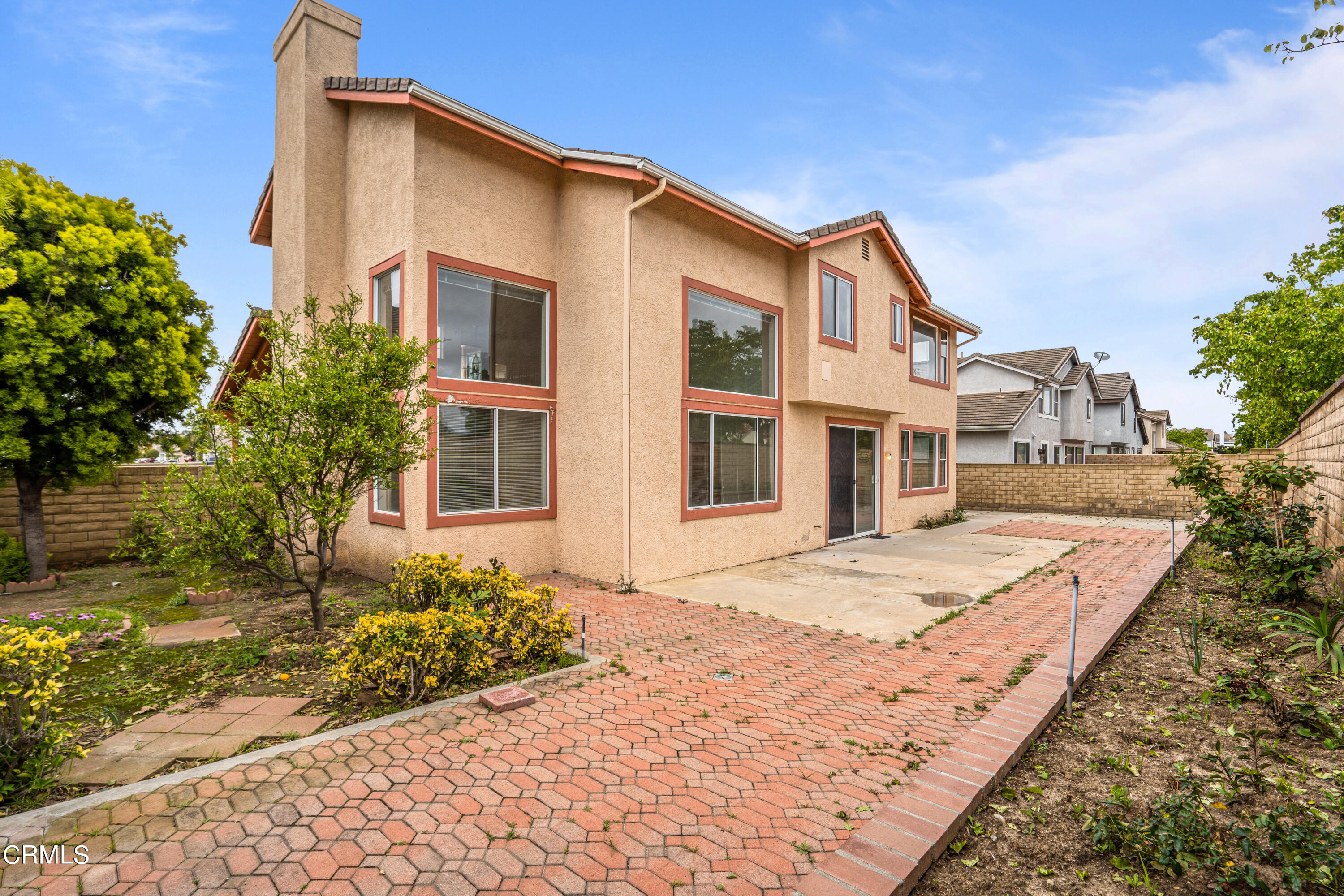 2410 Ivory Way Oxnard, CA 93036 - Photo 60 of 64 a front view of a house with a yard