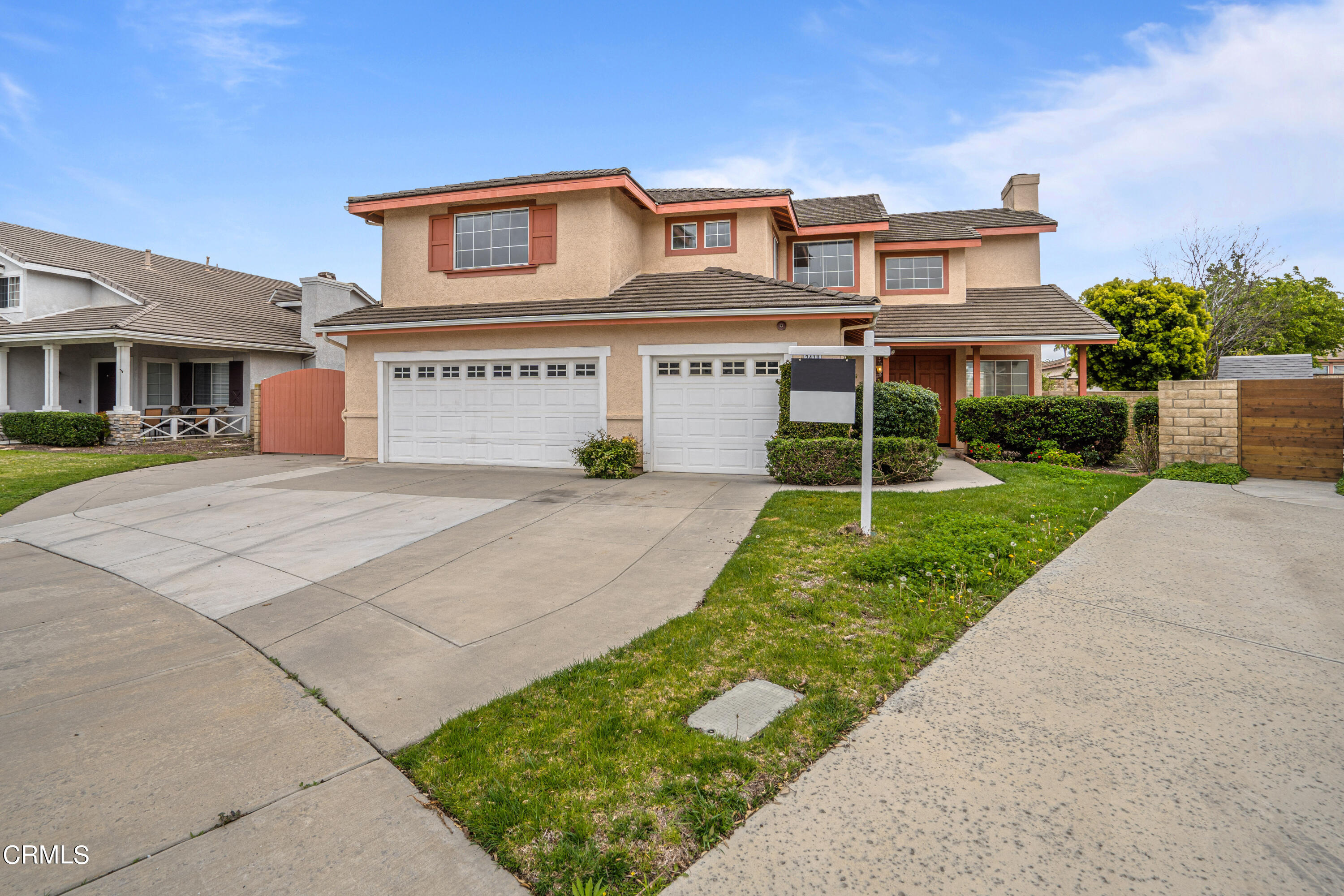 2410 Ivory Way Oxnard, CA 93036 - Photo 63 of 64 a front view of a house with a yard