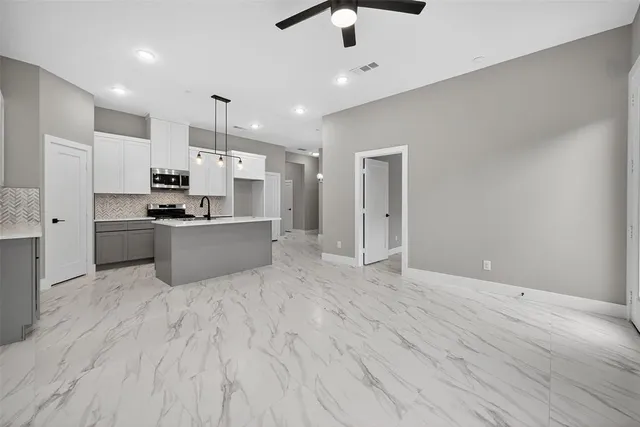 a front view of a house with a garage