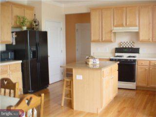126 Willow Grove Road Shamong, NJ 08088 - Photo 4 of 6 a kitchen with stainless steel appliances granite countertop a refrigerator and a stove