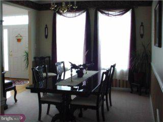 126 Willow Grove Road Shamong, NJ 08088 - Photo 5 of 6 a view of a dining room with furniture and a window