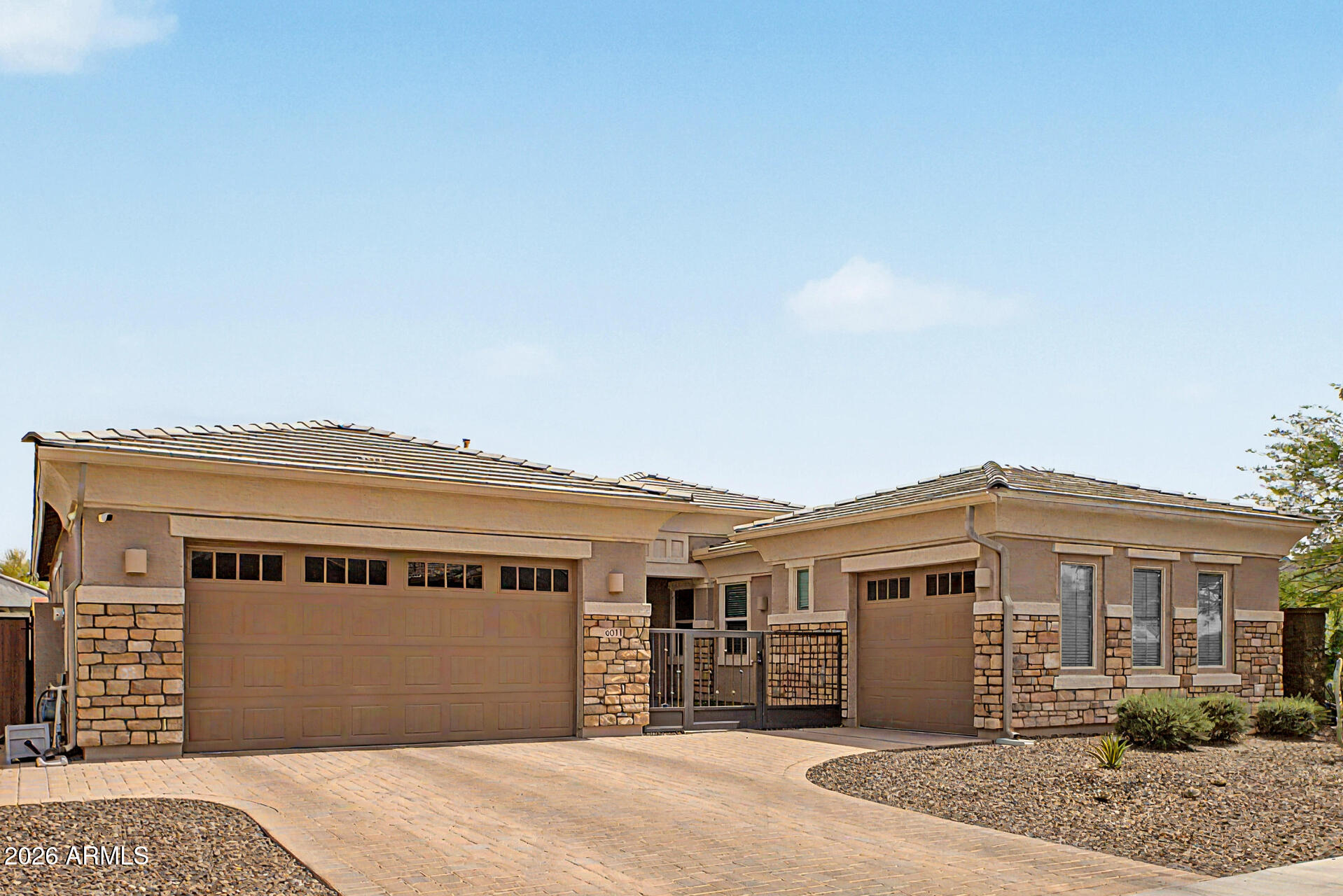 6511 West Steed Ridge Phoenix, AZ 85083 - Photo 2 of 41 a front view of a house with a yard