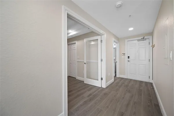 a bathroom with a shower toilet and sink