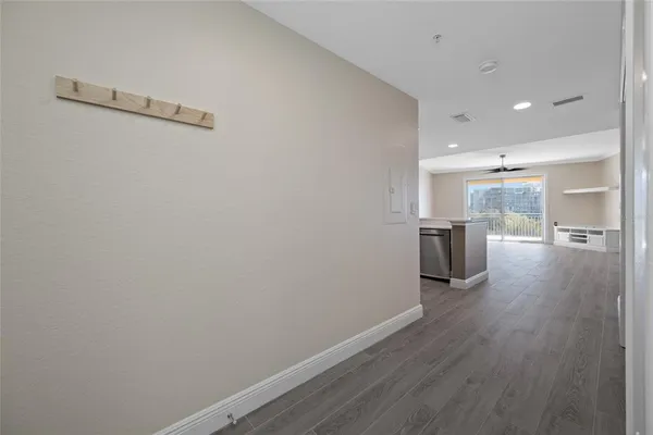 a view of an empty room with a window