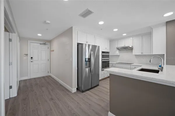 a view of a balcony with wooden floor