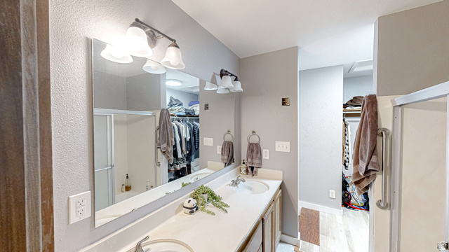 630 1100 West Provo, UT 84601 - Photo 18 of 64 Dual vanity with integrated sinks and a large wall-mounted mirror