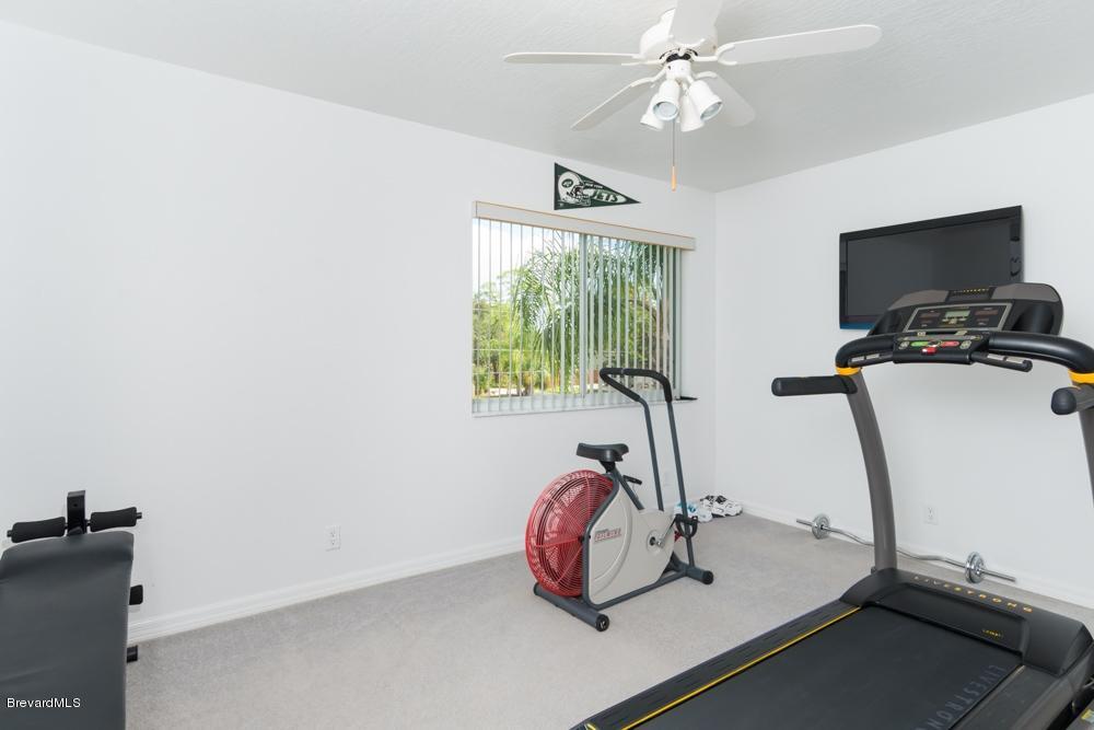 3570 Big Pine Road Melbourne, FL 32934 - Photo 22 of 27 a view of a room with gym equipment
