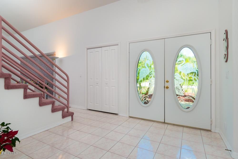 3570 Big Pine Road Melbourne, FL 32934 - Photo 5 of 27 a view of front door with washer and dryer