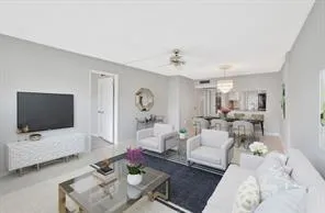 a view of a big room with closet and windows