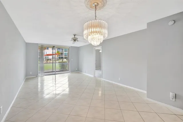 a bedroom with bed and a flat screen tv