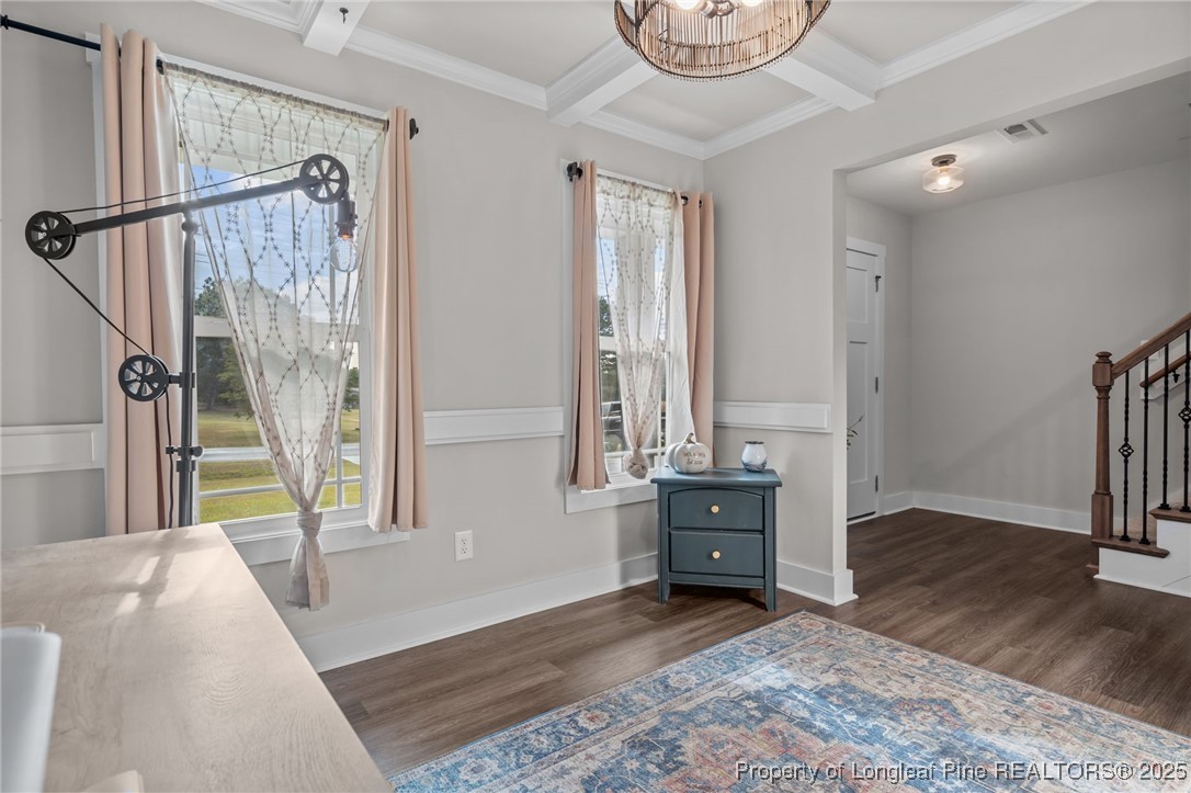 247 North Horace Walters Road Raeford, NC 28376 - Photo 13 of 35 a view of a bedroom with wooden floor and windows
