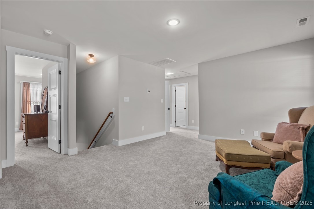 247 North Horace Walters Road Raeford, NC 28376 - Photo 16 of 35 a living room with furniture and a wooden floor