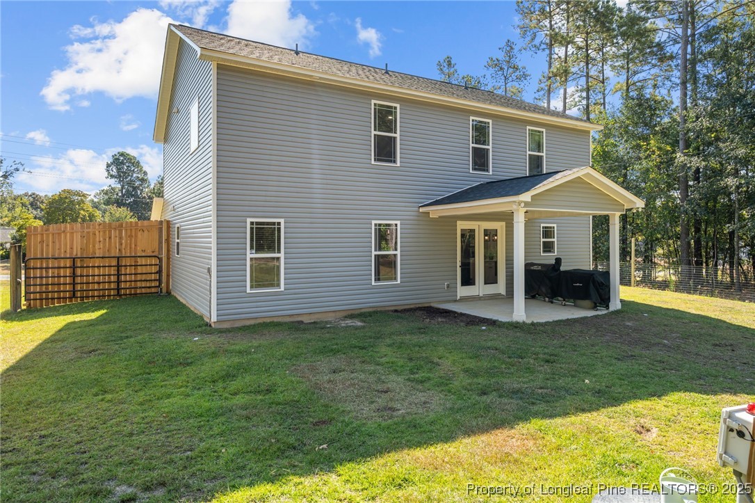 247 North Horace Walters Road Raeford, NC 28376 - Photo 31 of 35 a front view of a house with a garden