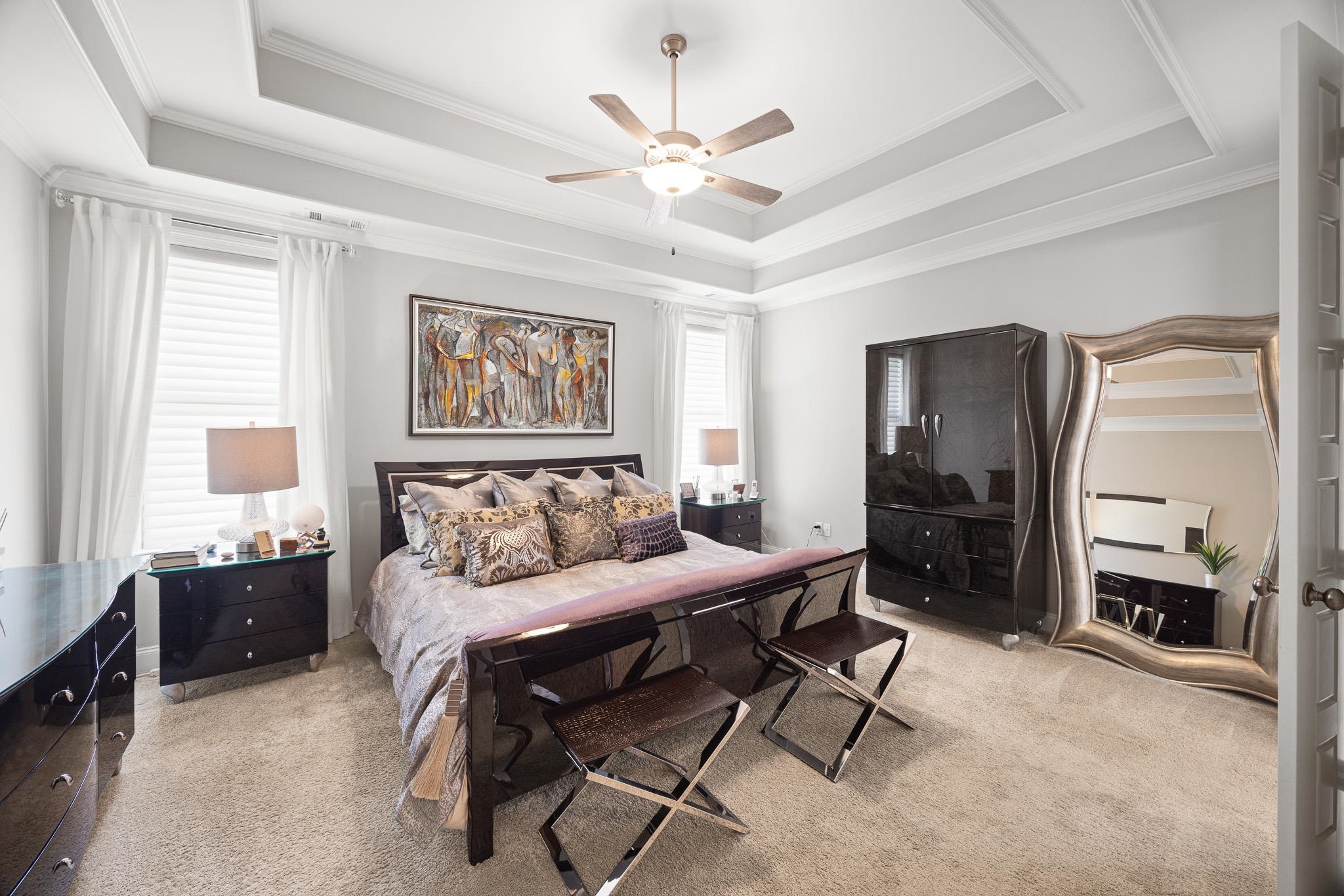 4711 Carousel Lane Collierville, TN 38017 - Photo 13 of 33 a living room with furniture a large window and a ceiling fan