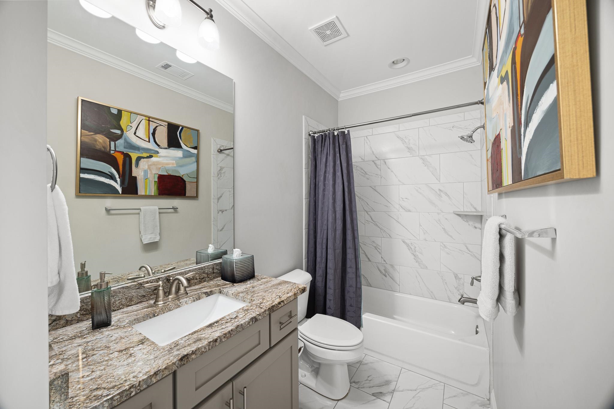 4711 Carousel Lane Collierville, TN 38017 - Photo 17 of 33 a bathroom with a granite countertop sink toilet and shower