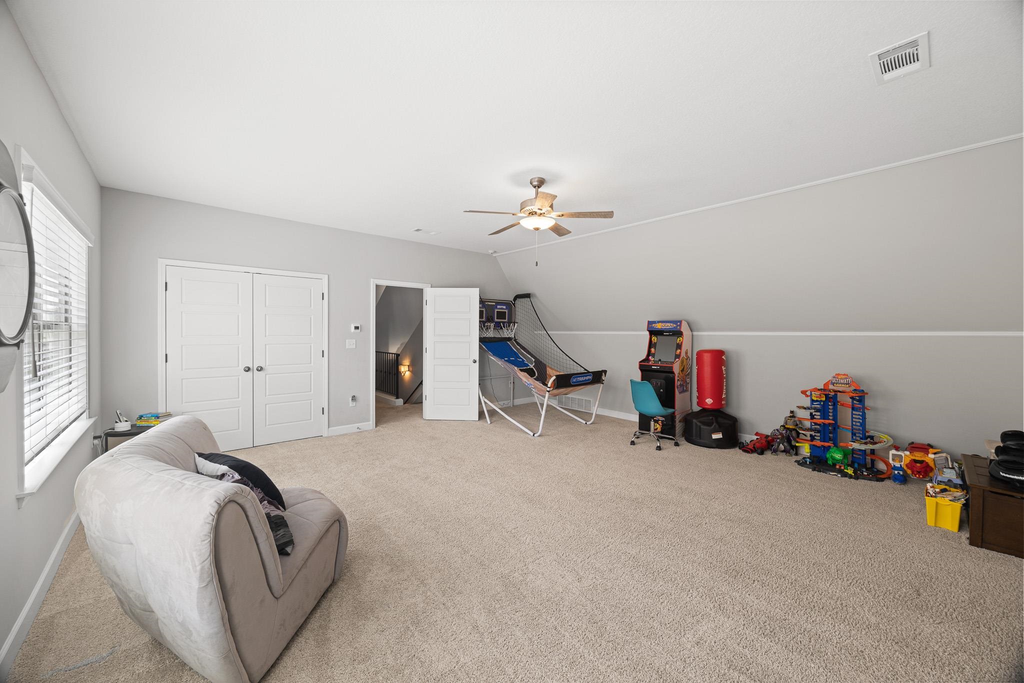 4711 Carousel Lane Collierville, TN 38017 - Photo 23 of 33 a view of a livingroom with storage and utility