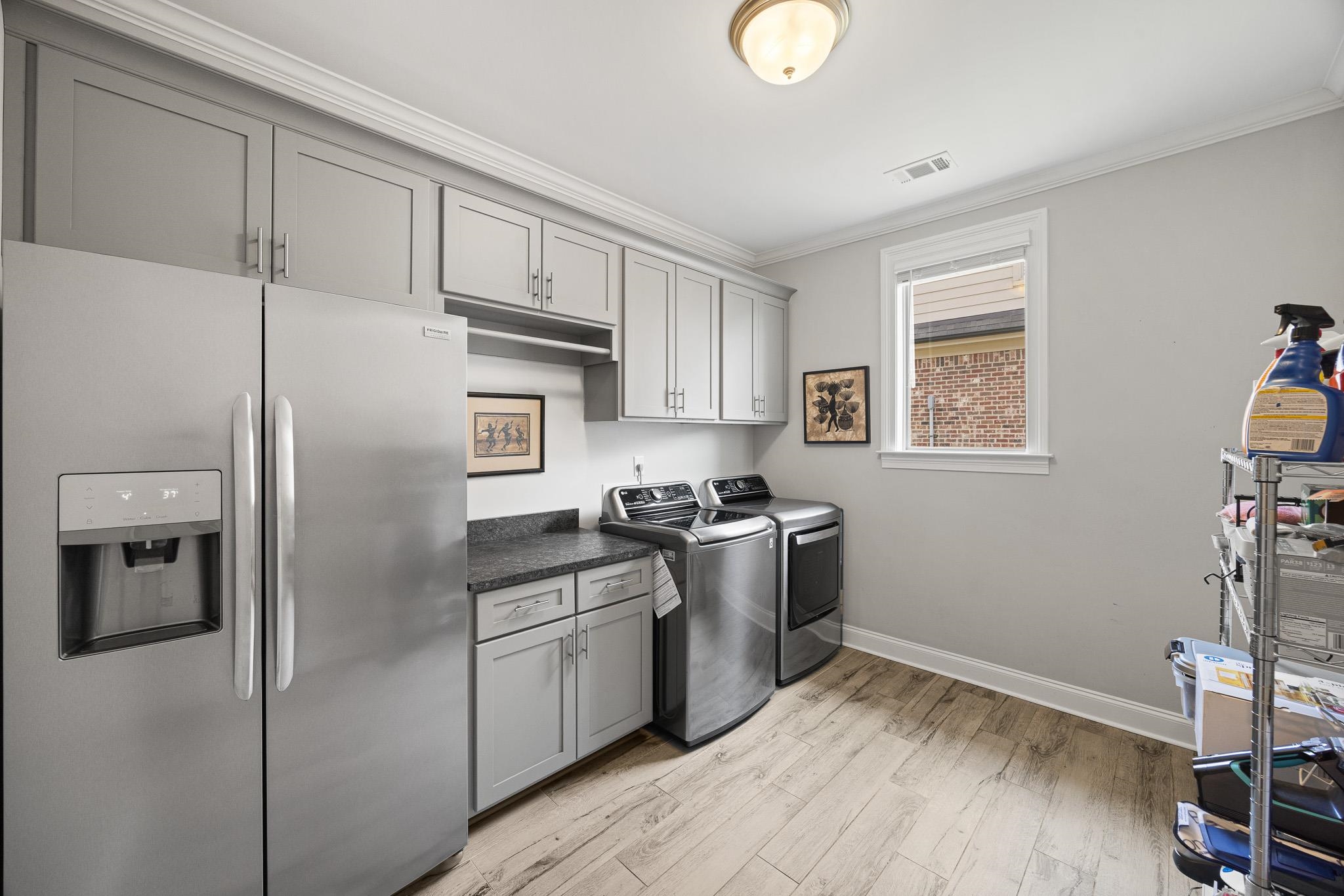 4711 Carousel Lane Collierville, TN 38017 - Photo 27 of 33 a kitchen with stainless steel appliances granite countertop a refrigerator stove and sink