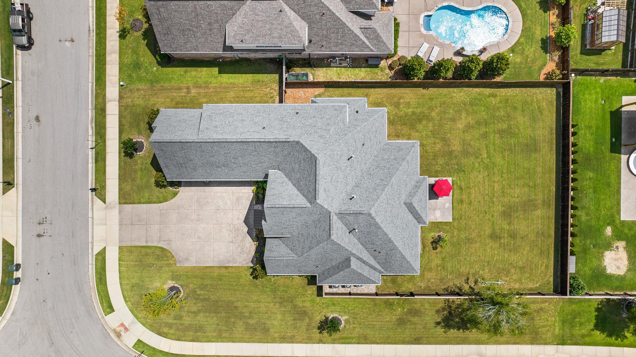 4711 Carousel Lane Collierville, TN 38017 - Photo 31 of 33 an aerial view of a house with a swimming pool